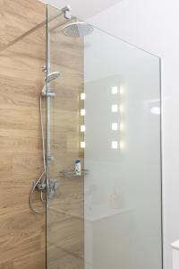 Kúpeľňa v ubytovaní Apartamenty Marii Konopnickiej Kraków