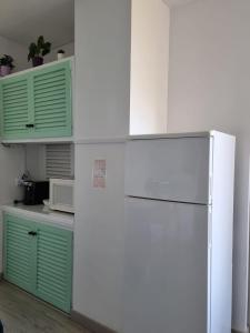 Kuchyň nebo kuchyňský kout v ubytování Your holidays apartment