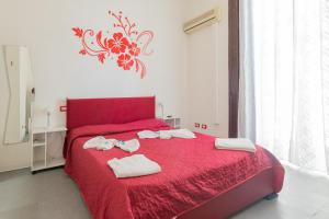 Posteľ alebo postele v izbe v ubytovaní MADB&B