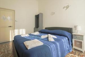 Posteľ alebo postele v izbe v ubytovaní MADB&B