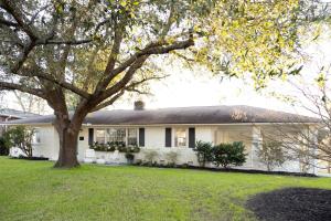 a white house with a tree in the yard at * Affordable Luxury Park Circle, Tres Chic! * in Charleston