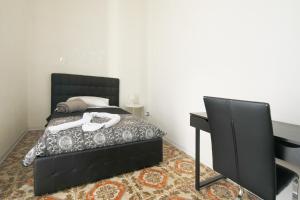 Posteľ alebo postele v izbe v ubytovaní MADB&B