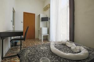 Posteľ alebo postele v izbe v ubytovaní MADB&B