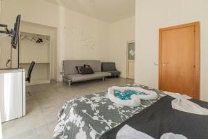 Posteľ alebo postele v izbe v ubytovaní MADB&B