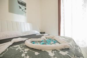 Posteľ alebo postele v izbe v ubytovaní MADB&B