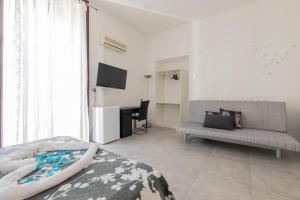 Posteľ alebo postele v izbe v ubytovaní MADB&B