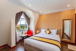 Postel nebo postele na pokoji v ubytování Anasia Hotel