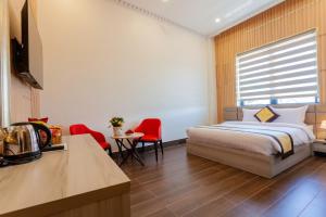 Postel nebo postele na pokoji v ubytování Anasia Hotel