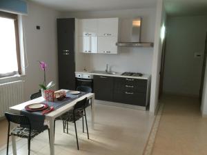 Kuchyň nebo kuchyňský kout v ubytování B&B Camelie