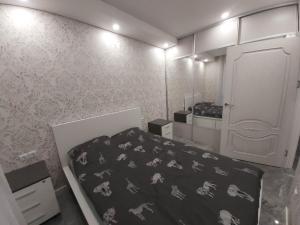 Voodi või voodid majutusasutuse Gilužio Rivjera toas