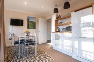 A cozinha ou cozinha compacta de Terlingham Lane Cottage