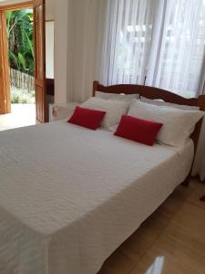 Postel nebo postele na pokoji v ubytování Bendito Recanto + 28 fotografií