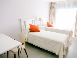 Posteľ alebo postele v izbe v ubytovaní Апартамент с 2 спальнями на пляже La Tejita 2B