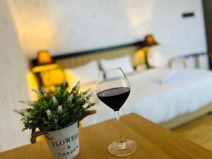Ένα ή περισσότερα κρεβάτια σε δωμάτιο στο Green Hotel ANG