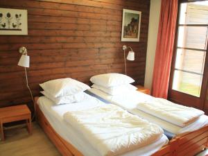 Ein Bett oder Betten in einem Zimmer der Unterkunft Appartement Châtel, 2 pièces, 4 personnes - FR-1-200-268