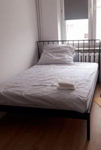 Postel nebo postele na pokoji v ubytování Apartament Piesza