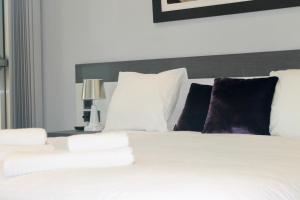 A bed or beds in a room at Apartamento - Riba De Sella