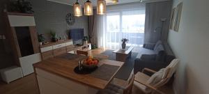 Kuchyňa alebo kuchynka v ubytovaní NOVA Apartment + 7 fotografií