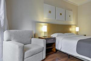 Ένα ή περισσότερα κρεβάτια σε δωμάτιο στο Suite at the Grand Plaza Avenida Paulista +17 φωτογραφίες