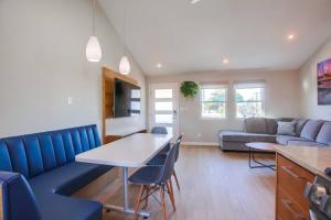 a living room with a couch and a table and chairs at Ocean Beach Retreat 2BR Newly Remodeled, 2 Blocks to Sand and Shops in San Diego