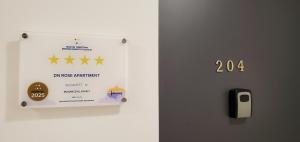 Certifikát, ocenenie alebo iný dokument vystavený v ubytovaní DN Rose Apartmant