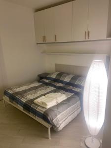 Ένα ή περισσότερα κρεβάτια σε δωμάτιο στο Cisanello appartamento Francesca