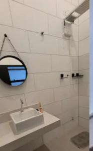 Ένα μπάνιο στο Casa em Barequeçaba recém construída Alto Padrão +31 φωτογραφίες