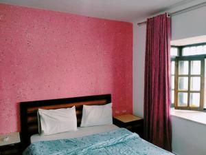 A bed or beds in a room at Sharm Delta Village 203/114