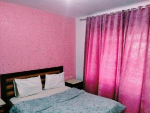 A bed or beds in a room at Sharm Delta Village 203/114