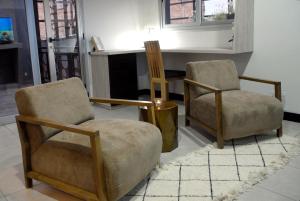 Posezení v ubytování Ayres home VIP MODERNO SOLO ADULTOS CENTRICO
