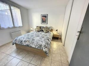 Posteľ alebo postele v izbe v ubytovaní Spacieux T2 tout confort