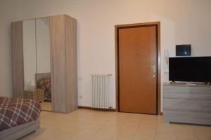 TV a/nebo společenská místnost v ubytování La Quiete + 6 fotografií