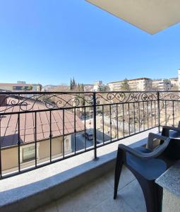 a balcony with a view of a building at Central Apartment for 4 Guests Next to State Opera in Stara Zagora
