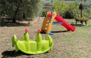 a childrens playground with a slide and a swing set at Egidio in Vigne