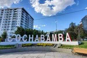 a large sign in front of a building at Departamento 3 D. Cochabamba in Cochabamba