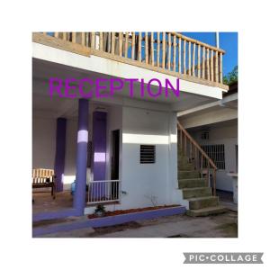 a building with a staircase and a sign that reads respiration at Mandurah's Inn, Malapascua in Malapascua Island +54 photos