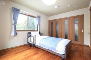Letto o letti in una camera di 24 ORIYA Mt Fuji -鳴沢 NARUSAWA-