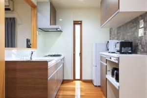 Cucina o angolo cottura di 24 ORIYA Mt Fuji -鳴沢 NARUSAWA-