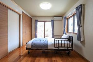 Letto o letti in una camera di 24 ORIYA Mt Fuji -鳴沢 NARUSAWA-