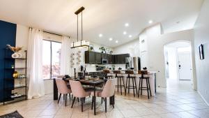 a kitchen with a table and chairs in a room at 69th Glendale home in Glendale