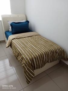 Krevet ili kreveti u jedinici u objektu Madinatus Syifa Homestay