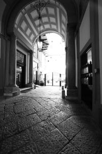 a black and white photo of a hallway in a building at Hotel Piazza Bellini & Apartments in Naples