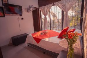Postel nebo postele na pokoji v ubytování Hotel Palma De Sevilla