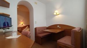 TV a/nebo společenská místnost v ubytování Hotel Zebru