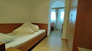 Postel nebo postele na pokoji v ubytování Hotel Zebru