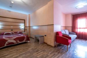 Postel nebo postele na pokoji v ubytování Hotel Pio XII Jumilla