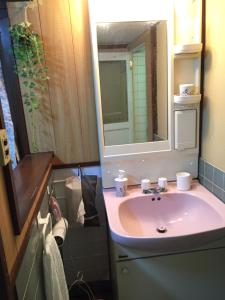 Koupelna v ubytování ゲストハウスさくら Guesthouse Sakura + 18 fotografií