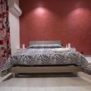 Posteľ alebo postele v izbe v ubytovaní MADB&B