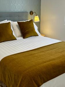 Giường trong phòng chung tại Casa Román V Edificio rehabilitado sin ascensor