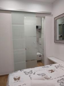 Ванная комната в Studio apartman Oliva +11 фотографий